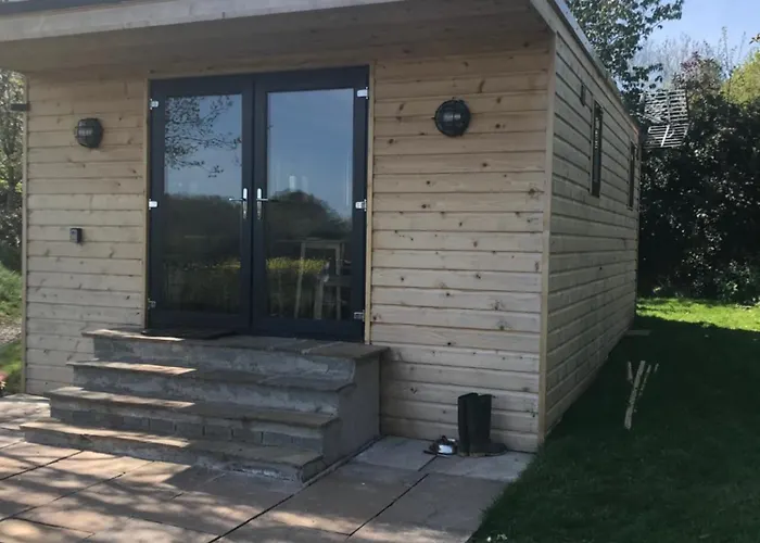 Secluded Log Cabin In Beautiful Private Gardens